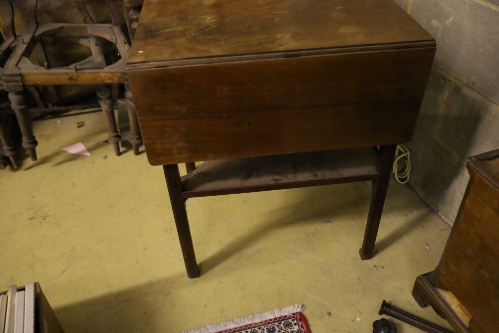 A George III mahogany drop flap two tier table, width 56cm, depth 61cm, height 71cm